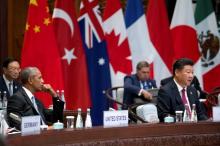 U.S. President Barack Obama watches as Chinese President Xi Jinping speaks at the opening ceremony of the G20 Summit in Hangzhou, Zhejiang province, China, September 4, 2016. PHOTO BY REUTERS/Mark Schiefelbein
