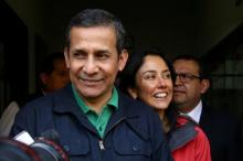 Peru's former President Ollanta Humala and former first lady Nadine Heredia leave the Nationalist Party headquarters in Lima, Peru, July 13, 2017. PHOTO BY REUTERS/Guadalupe Pardo