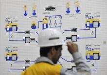 An Iranian operator monitors the nuclear power plant unit in Bushehr
