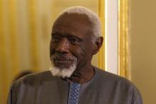 Senegalese artist Ousmane Sow listens to French President Francois Hollande's speech during a ceremony at the Elysee Palace in Paris, December 11, 2013. PHOTO BY REUTERS/Charles Platiau