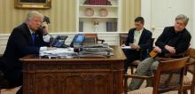 President Trump, with National Security Advisor Michael Flynn and senior advisor Steve Bannon, speaks by phone with Australia's Prime Minister Malcolm Turnbull. PHOTO BY REUTERS/Jonathan Ernst