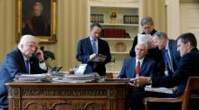 U.S. President Donald Trump (L-R), joined by Chief of Staff Reince Priebus, Vice President Mike Pence, senior advisor Steve Bannon, Communications Director Sean Spicer and National Security Advisor Michael Flynn, speaks by phone with Russia's President Vladimir Putin in Washington, U.S., January 28, 2017. PHOTO BY REUTERS/Jonathan Ernst