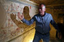 Secretary-General of the Supreme Council of Antiquities, Mostafa Waziri, explaining paintings on the walls of the newly discovered burial site, Tomb of Tutu, at al-Dayabat, Sohag, Egypt April 5, 2019. PHOTO BY REUTERS/Mohamed Abd El Ghany