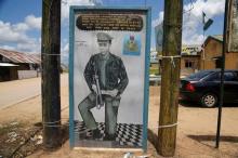 A painting depicting Isaac Adaka Boro, a former Niger Delta militant in the 1960s, is seen along a road in the village of Kiama near Yenagoa, in Nigeria's Delta region, May 18, 2016. PHOTO BY REUTERS/Akintunde Akinleye
