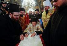 Ecumenical Patriarch Bartholomew and Metropolitan Epifaniy, head of the Orthodox Church of Ukraine, attend a signing ceremony marking the new Ukrainian Orthodox church's independence, at St. George's Cathedral, the seat of the Ecumenical Patriarchate, in Istanbul, Turkey, January 5, 2019. PHOTO BY REUTERS/Murad Sezer