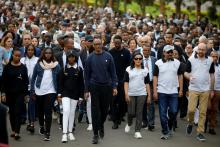 Rwandan President Paul Kagame walks next to other state leaders during a walk to remember from Parliament to Amahoro stadium where many survivors took refuge, as part of the commemoration of the 25th anniversary of the Rwandan genocide, in Kigali, Rwanda, April 7, 2019. PHOTO BY REUTERS/Baz Ratner