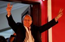 Peruvian presidential candidate Pedro Pablo Kuczynski gestures to followers in Lima, Peru, June 5, 2016. PHOTO BY REUTERS/Guadalupe Pardo