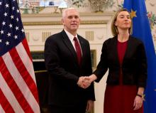 U.S. Vice President Mike Pence poses with European Union foreign policy chief Federica Mogherini in Brussels, Belgium, February 20, 2017. PHOTO BY REUTERS/Virginia Mayo
