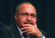 Peter O'Neill, the Prime Minister of Papua New Guinea (PNG), speaks during the opening of the PNG Mining and Petroleum Investment conference in Sydney, Australia, December 5, 2016. PHOTO BY REUTERS/David Gray
