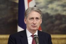 British Foreign Secretary Philip Hammond pauses as he speaks during a meeting with Finnish Foreign Minister Erkki Tuomioja (not pictured) in Helsinki, January 8, 2015. PHOTO BY REUTERS/Markku Ulander
