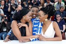 Director Wanuri Kahiu, cast members Sheila Munyiva and Samantha Mugatsia at the 71st Cannes Film Festival Photocall for the film "Rafiki" in competition for the category Un Certain Regard, Cannes, France. May 9, 2018.  PHOTO BY REUTERS/Jean-Paul Pelissier