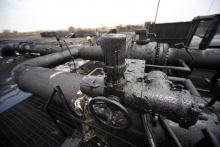 Sudanese engineers check the damage to an oil pipeline in a largely damaged oilfield in Heglig. PHOTO BY REUTERS/Mohamed Nureldin Abdallah