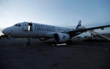 A plane, that was damaged during clashes, is seen at Mitiga airport in Tripoli, Libya, January 15, 2018. PHOTO BY REUTERS/Ismail Zitouny