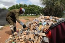 Somali refugee Abtidon Ali Mahat sorts through plastic waste at the recycling plant in Dabaab refugee camp in Garissa County, Kenya on May 30, 2018. PHOTO BY Thomson Reuters Foundation/Nita Bhalla
