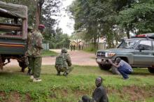 Kenyan police officers hold their position during an operation against a suspected recruiter for the Somali militant group al Shabaab at the Kapenguria police station in Kapenguria, western Kenya, July 14, 2016. PHOTO BY REUTERS/Stringer