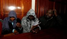 Kenyan police officers Silvia Wanjohi, Stephen Morogo and Fredrick Leliman, suspected of killing human rights lawyer Willie Kimani, his client and their driver, sit in the dock at Milimani Law courts in Nairobi, Kenya, July 4, 2016. PHOTO BY REUTERS/Thomas Mukoya