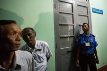 A policeman stands guard at the forensic department of a hospital where the body of Ko Ni is kept, a prominent member of Myanmar's Muslim minority and legal adviser for Myanmar's ruling National League for Democracy, in Yangon, Myanmar, January 29, 2017. PHOTO BY REUTERS/Aung Kyaw Htet