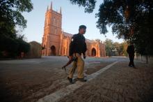A policeman keeps guard outside St. John Cathedral Church ahead of the Christmas celebrations in Peshawar, Pakistan, December 21, 2017. PHOTO BY REUTERS/Fayaz Aziz