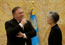 U.S. Secretary of State Mike Pompeo speaks with South Korean Foreign Minister Kang Kyung-wha at the presidential Blue House in Seoul, South Korea, October 7, 2018. PHOTO BY REUTERS/Ahn Young-joon