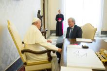 Pope Francis meets Libero Milone (R), the Vatican's auditor general, at the Vatican, April 1, 2016. PHOTO BY REUTERS/Osservatore Romano