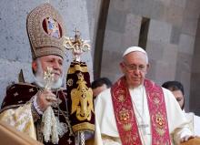 Pope Francis (R) and Catholicos of All Armenians Karekin II (L) leave at the end of the Divine Liturgy at the Armenian Cathedral in Etchmiadzin, Armenia, June 26, 2016. PHOTO BY REUTERS/Alessandro Bianchi