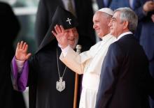Pope Francis (C), Armenia's President Serzh Sargsyan and Catholicos of All Armenians Karekin II (L) attend a welcoming ceremony at Zvartnots airport outside Yerevan, Armenia, June 24, 2016. PHOTO BY REUTERS/David Mdzinarishvili