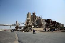 Workers walk at the Red Sea port of Hodeida, Yemen, November 7, 2017. PHOTO BY REUTERS/Abduljabbar Zeyad