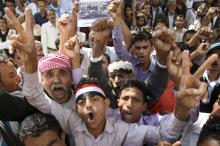 Anti-Houthi protesters shout slogans during a demonstration against the Shi'ite Muslim militia group in the southwestern city of Taiz, February 14, 2015. PHOTO BY REUTERS/Mohamed al-Sayaghi
