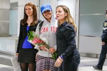Rahaf Mohammed al-Qunun (C) accompanied by Canadian Minister of Foreign Affairs Chrystia Freeland (R), arrives at Toronto Pearson International Airport in Toronto, Ontario, Canada, January 12, 2019. PHOTO BY REUTERS/Carlos Osorio