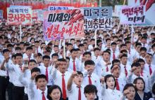 An anti-U.S. rally at Kim Il Sung Square in this September 23, 2017 photo released by North Korea's Korean Central News Agency (KCNA) in Pyongyang on September 24, 2017. Placards read (L-R) "A global military power", "Be through with the U.S.", "The U.S. is evil's headquarters", "Old foe the U.S." PHOTO BY REUTERS