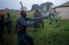 SPLA-IO (SPLA-In Opposition) rebels fire weapons during an assault on government SPLA (Sudan People's Liberation Army) soldiers in the town of Kaya, on the border with Uganda, South Sudan, August 26, 2017. PHOTO BY REUTERS/Goran Tomasevic
