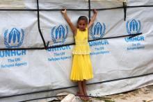 A Syrian refugee girl stands outside a tent as she poses at a refugee camp in Zahrani town, southern Lebanon, June 13, 2018. PHOTO BY REUTERS/Ali Hashisho