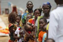 Ivorian refugees wait in line to be screened as they arrive from Liberia in the village of Prolo, Ivory Coast, May 20,2016. PHOTO BY REUTERS/Luc Gnago
