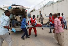 Rescuers carry a wounded man from the scene of an explosion to an ambulance in Hodan district, Mogadishu, Somalia, September 10, 2018. PHOTO BY REUTERS/Feisal Omar