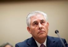 Rex Tillerson, chairman and CEO of ExxonMobil, testifies about the company's acquisition of XTO Energy before the House Energy and Environment Subcommittee on Capitol Hill in Washington, January 20, 2010. PHOTO BY REUTERS/Joshua Roberts