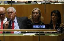 U.S. Secretary of State Rex Tillerson and U.S. Ambassador to the U.N. Nikki Haley (R) listen as U.S. President Donald Trump addresses the 72nd United Nations General Assembly at U.N. headquarters in New York, U.S., September 19, 2017. PHOTO BY REUTERS/Brendan McDermid