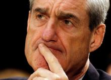 FBI Director Robert Mueller pauses after making an opening statement at the U.S. Senate Judiciary Committee hearing on Capitol Hill in Washington, DC, U.S. on June 19, 2013. PHOTO BY REUTERS/Larry Downing