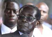 Zimbabwe President Robert Mugabe addresses supporters outside his ZANU PF party headquarters in Harare, October 30,2014. PHOTO BY REUTERS/Philimon Bulawayo