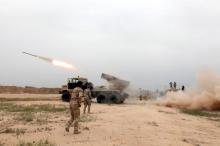 Iraqi soldiers firing a rocket toward Islamic State militants on the outskirt of the Makhmour south of Mosul, Iraq, March 25, 2016. PHOTO BY REUTERS/Azad Lashkari