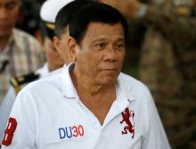 Philippine President Rodrigo Duterte arrives at the military's Camp Tecson to talk to soldiers in San Miguel, Bulacan in northern Philippines, September 15, 2016. PHOTO BY REUTERS/Erik De Castro