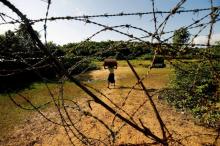 A Rohingya man carrying his belongings approaches the Bangladesh-Myanmar border in Bandarban, an area under Cox's Bazar authority, Bangladesh, August 29, 2017. PHOTO BY REUTERS/Mohammad Ponir Hossain