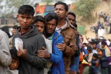 Rohingya refugees line up for daily essentials distribution at Balukhali camp, near Cox's Bazar, Bangladesh, January 15, 2018. PHOTO BY REUTERS/Tyrone Siu
