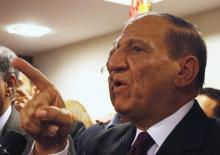 Egypt's former army chief of staff Sami Anan, speaks during a news conference about his position in the next presidential election at his office in Cairo, March 13, 2014. PHOTO BY REUTERS/Mohamed Abd El Ghany