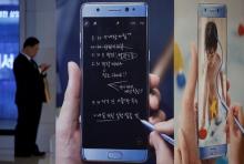 A man uses his mobile phone next to advertisements promoting Samsung Electronics' Galaxy Note 7 at the company's headquarters in Seoul, South Korea, October 10, 2016. PHOTO BY REUTERS/Kim Hong-Ji