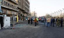 Iraqi security forces inspect the site of a bomb attack in Baghdad, Iraq, January 15, 2018. PHOTO BY REUTERS/Khalid al Mousily