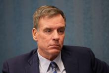 Sen. Mark Warner (D-VA) listens to military families discuss their hazardous living conditions during a meeting at the Peninsula Workforce Development Office in Newport News, Virginia, U.S., March 11, 2019. PHOTO BY REUTERS/Ryan M. Kelly