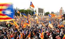 People hold Catalan separatist flags, known as "Esteladas", during a gathering to protest against legal challenges made by Spain's government against pro-independence Catalan politicians, in Barcelona, Spain, November 13, 2016. PHOTO BY REUTERS/Albert Gea