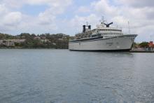 A 440-foot ship owned and operated by the Church of Scientology, SMV Freewinds, is docked under quarantine from a measles outbreak in port near Castries, St. Lucia, May 2, 2019. PHOTO BY REUTERS/Micah George