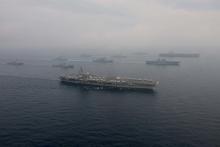 The U.S. Navy aircraft carriers USS Ronald Reagan (front) and USS Carl Vinson and (back R) sail with their strike groups and Japanese naval ships during training in the Sea of Japan, June 1, 2017. PHOTO BY REUTERS/U.S. Navy/Mass Communication Specialist 2nd Class Z.A. Landers