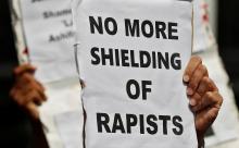 People hold placards at a protest against the rape of an eight-year-old girl, in Kathua, near Jammu and a teenager in Unnao, Uttar Pradesh state, in New Delhi, India, April 12, 2018. PHOTO BY REUTERS/Cathal McNaughton
